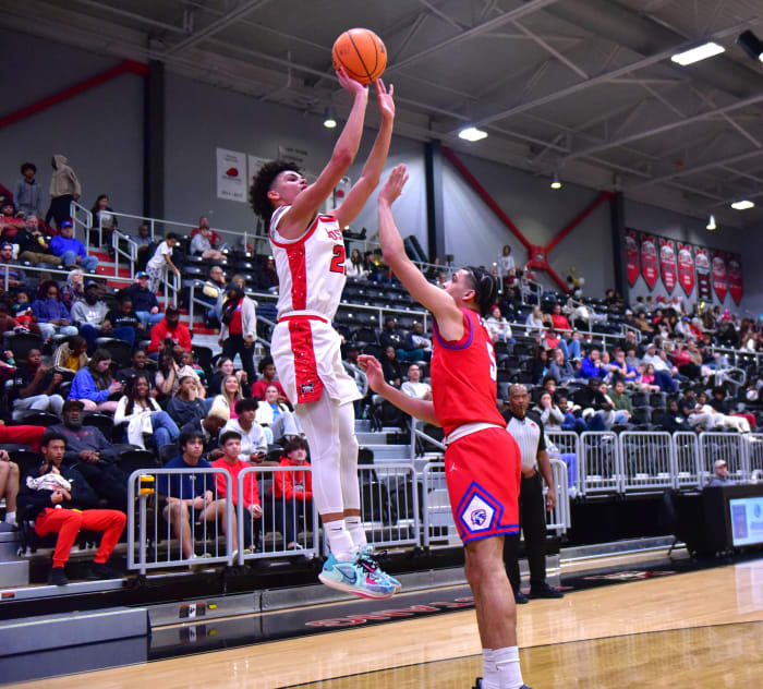 Mustang junior Roman Miller launches a shot during a game this season. Miller was named first team All-District and was the leading scorer for District 1-6A.